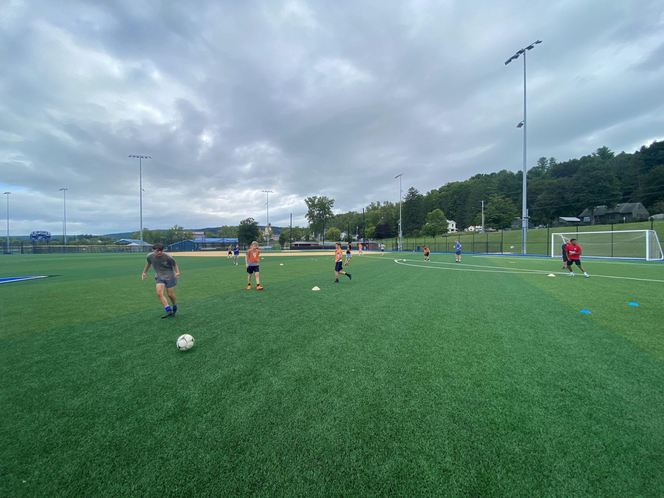 a boys soccer team trains