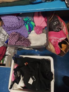warm clothes are seen in a bin