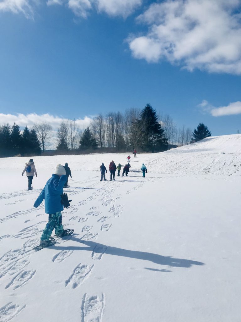 Nine students snowshow