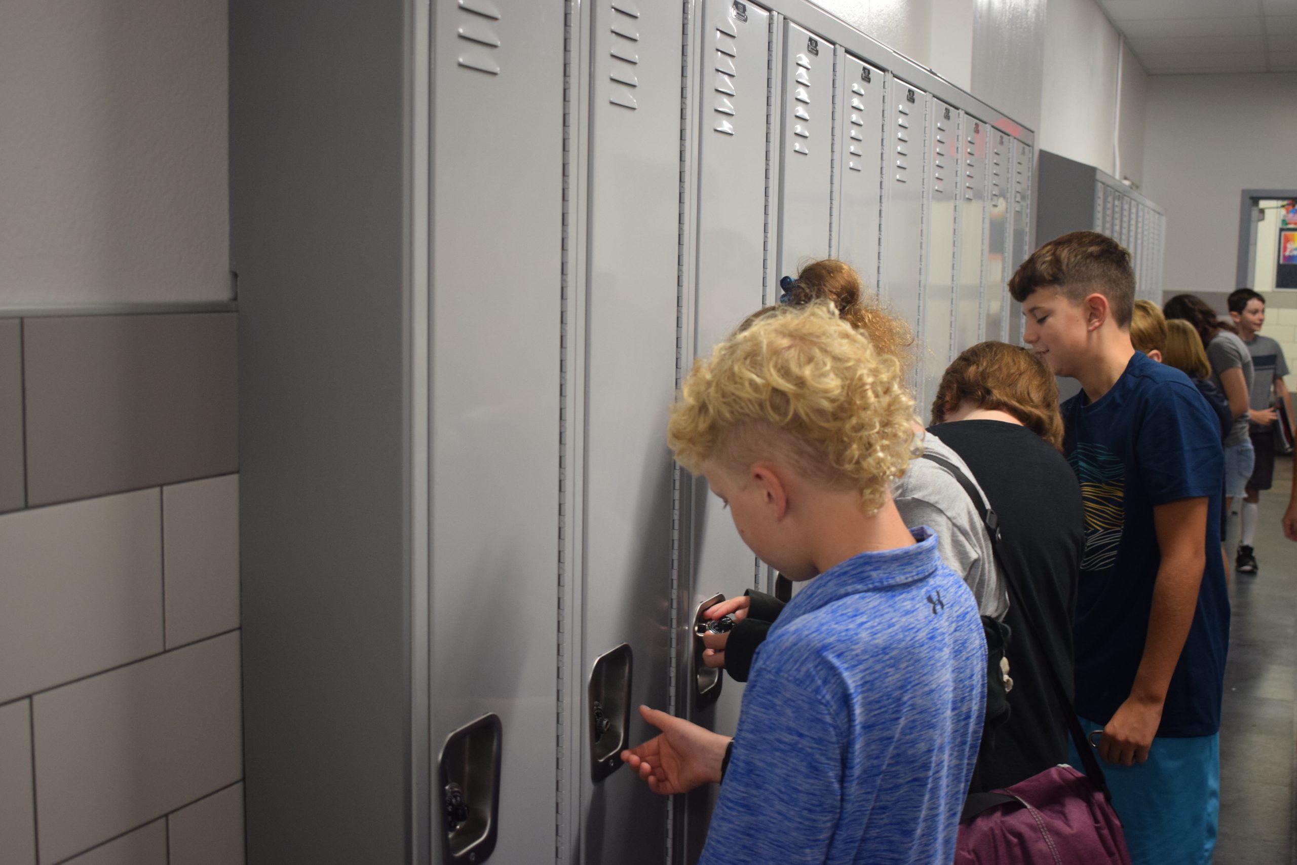 Students access their lockers