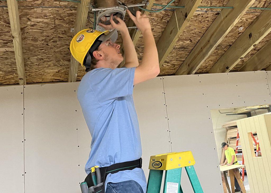 a student works on a construction project