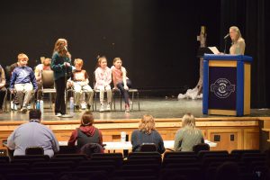 Students on stage at spelling bee