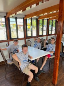 students at a table boat on a boat