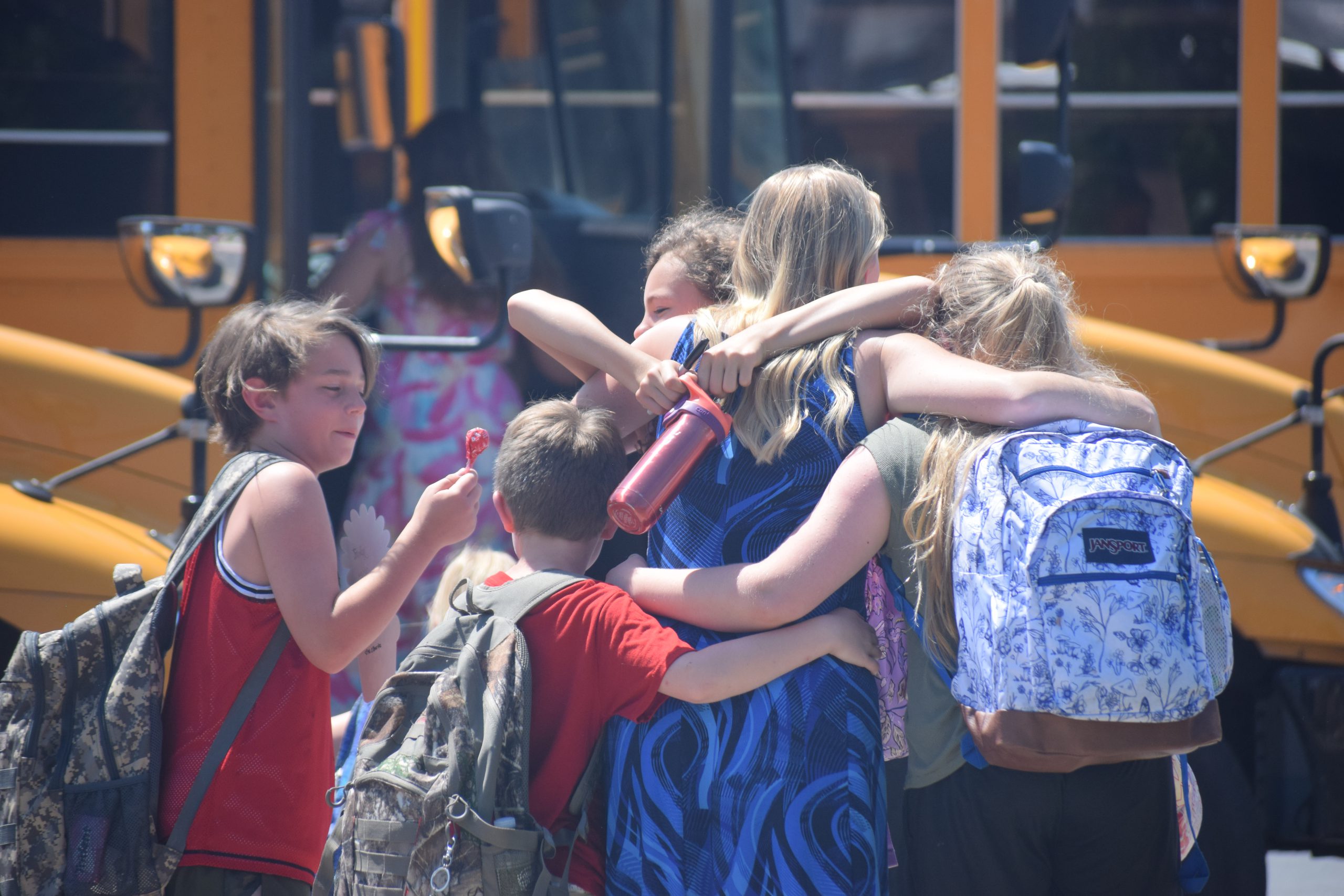 Students hug
