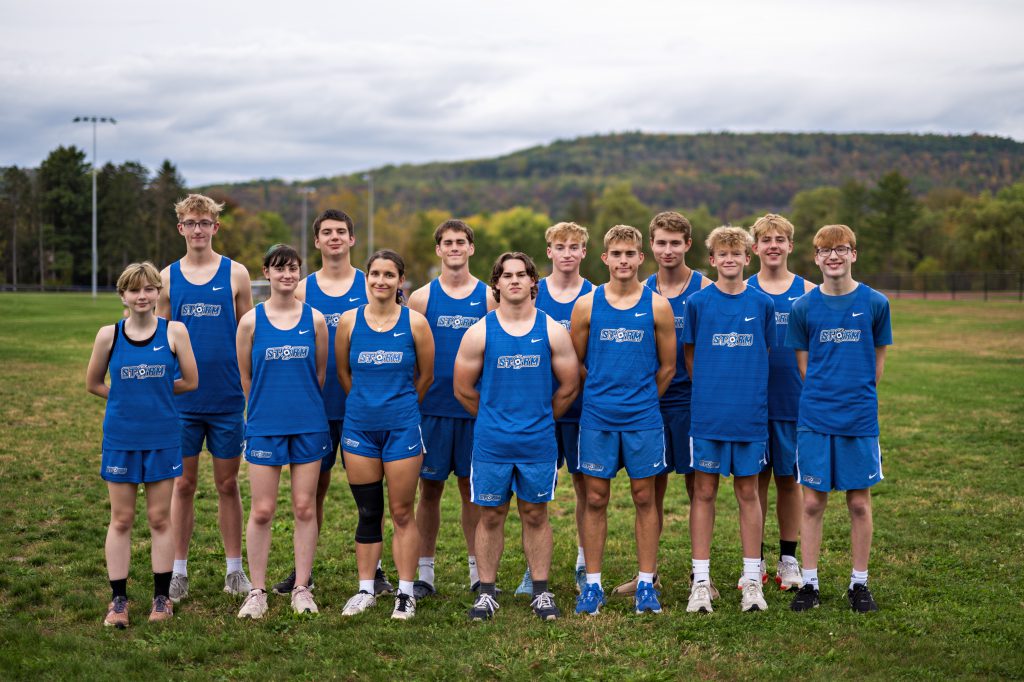 a sports team stands on grass