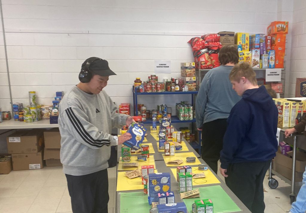 students help in pantry