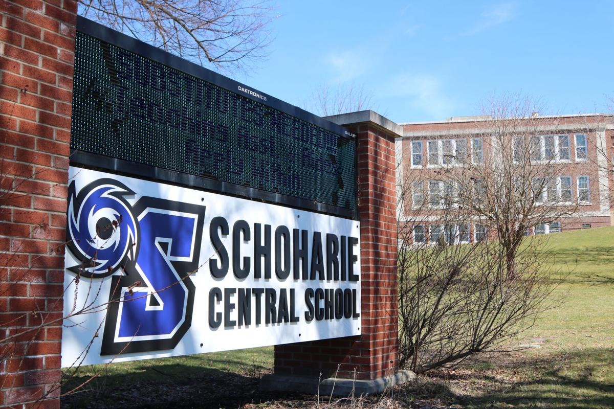 sign in front of school building