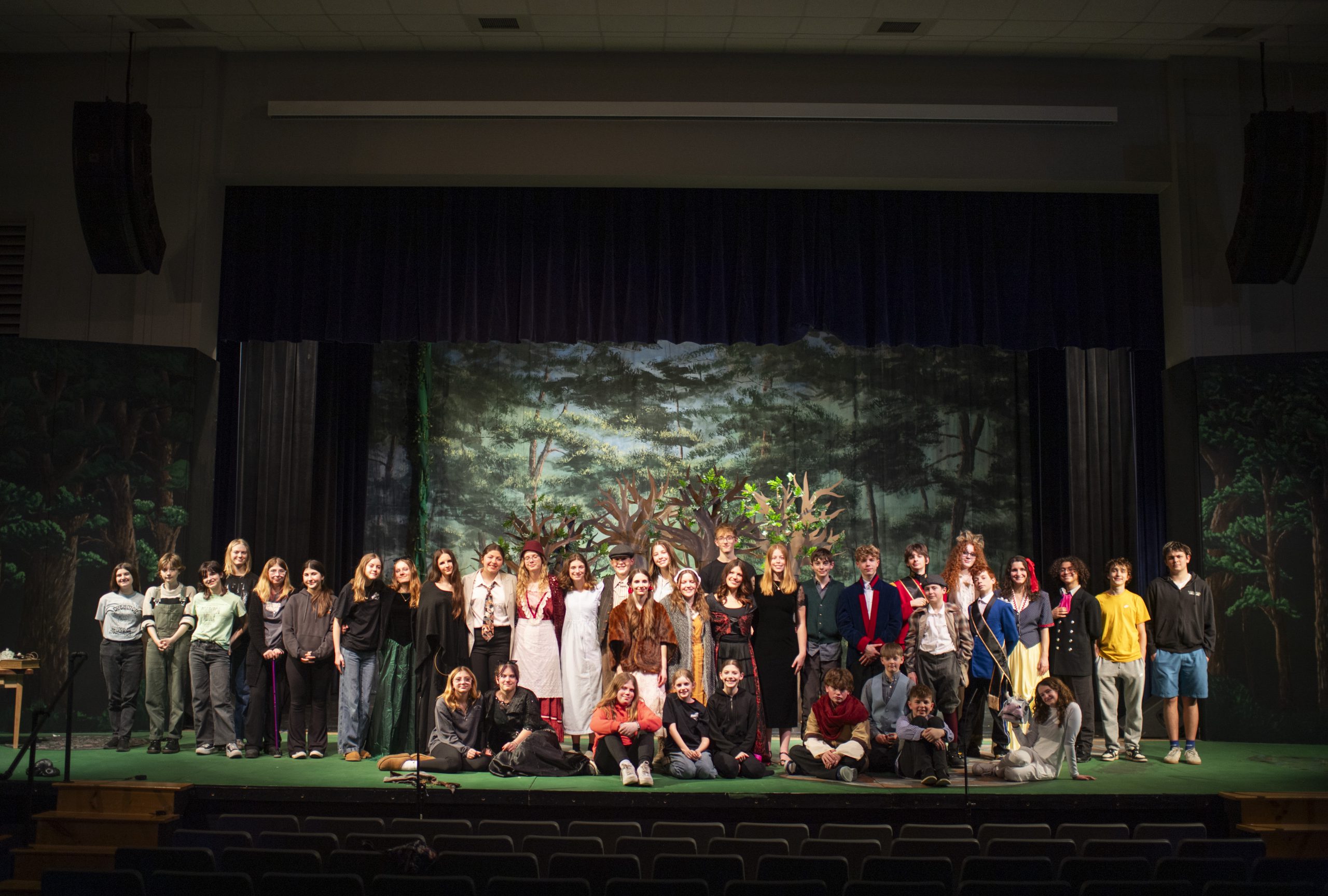 students in an ensemble on stage