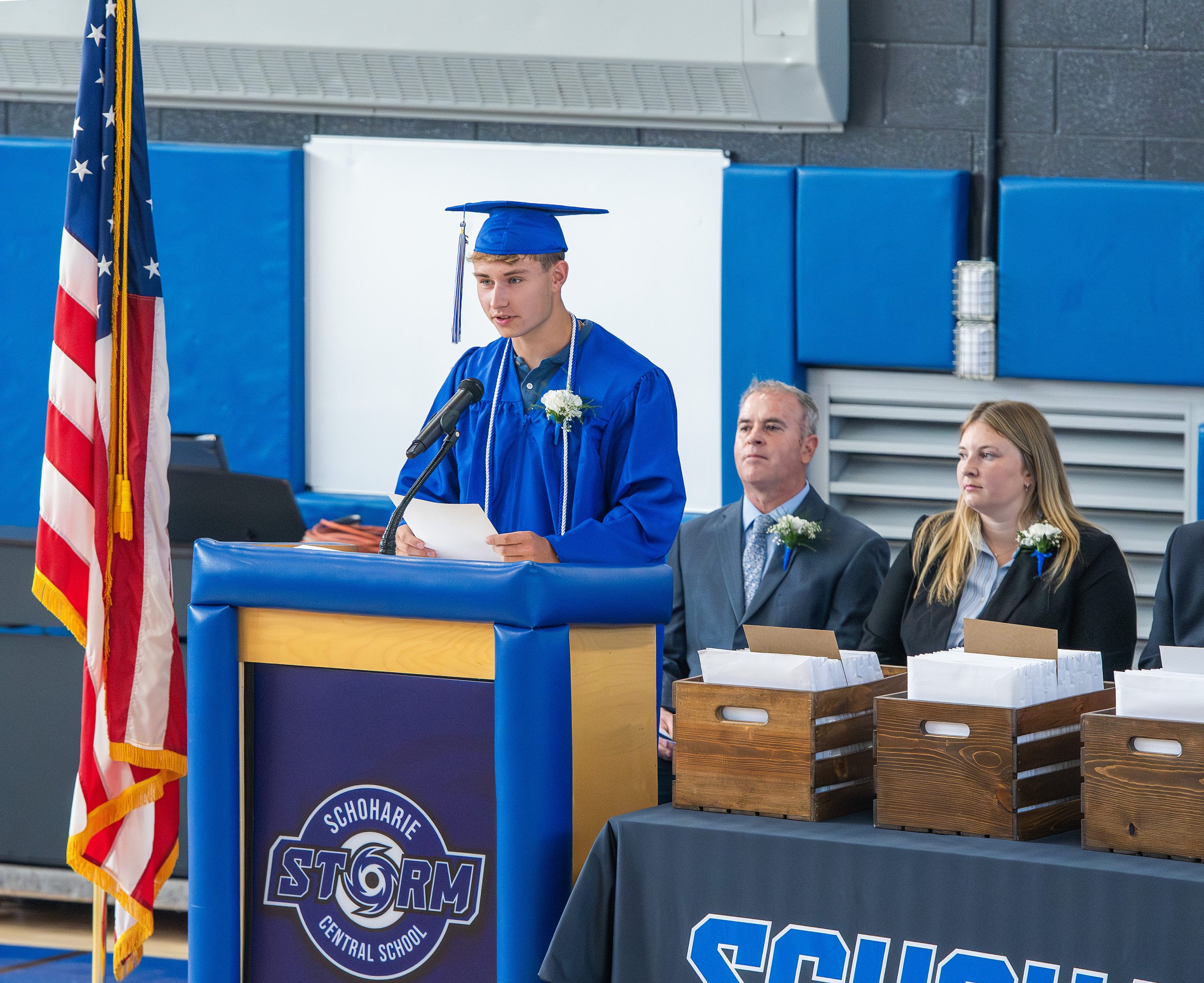 a student speaks at graduation