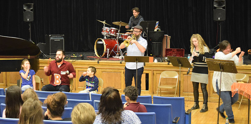 men drum and play cornet for seatd students