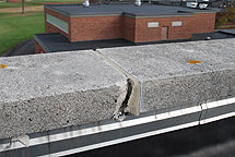 Crumbling parapet and mortar on roof