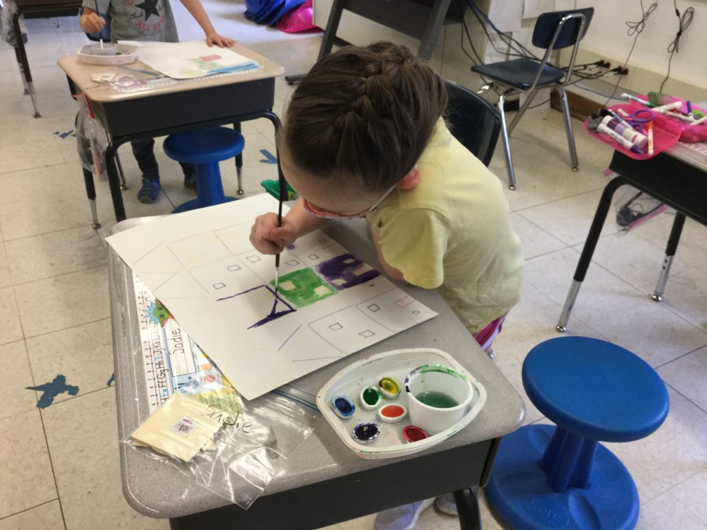 A student is seen painting