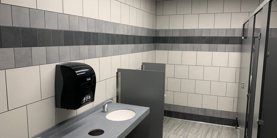 Bathroom tiles are seen