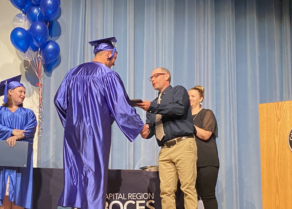 A student receives an award