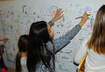 girl draws on the wall