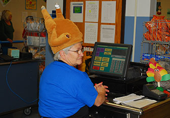 woman wearing a turkey hat